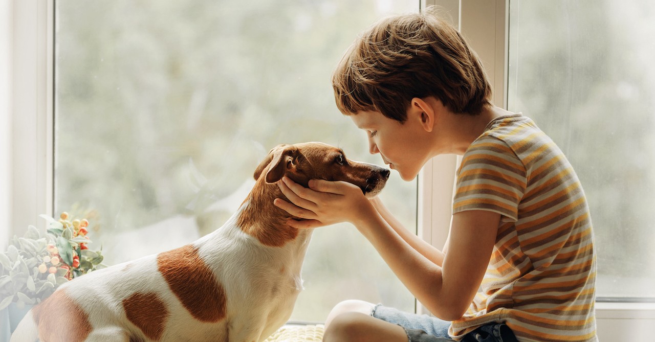 Boy and pet dog