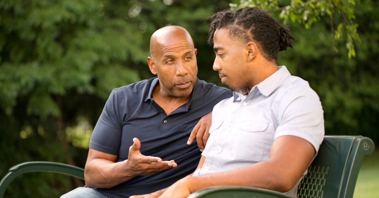 family discussion conversation serious father son, decisions to make before leaving church