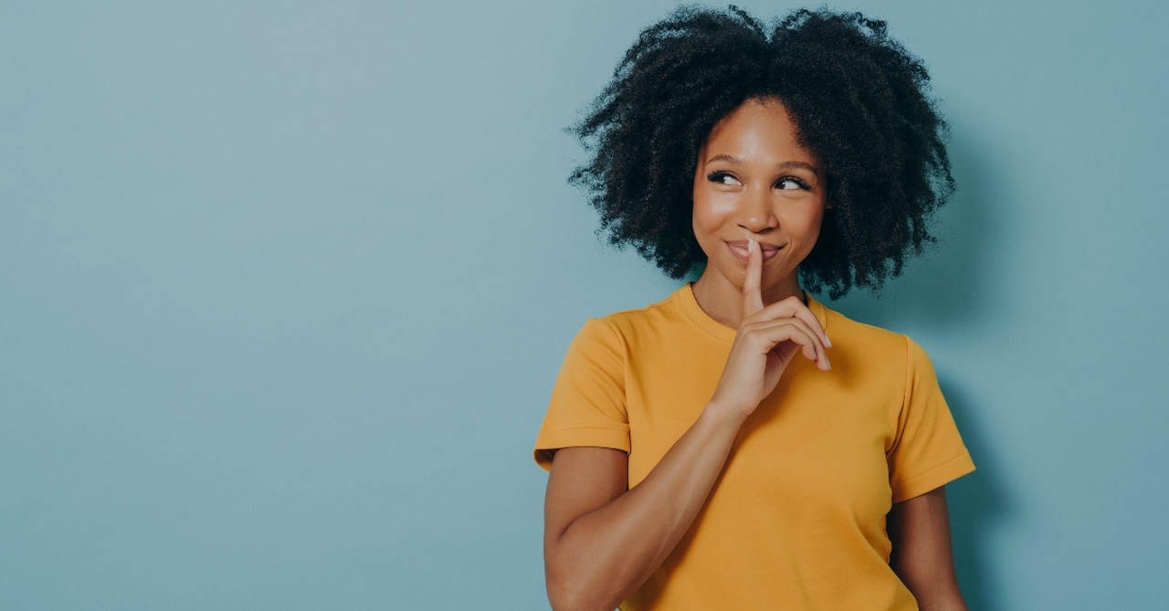 Woman signing quiet