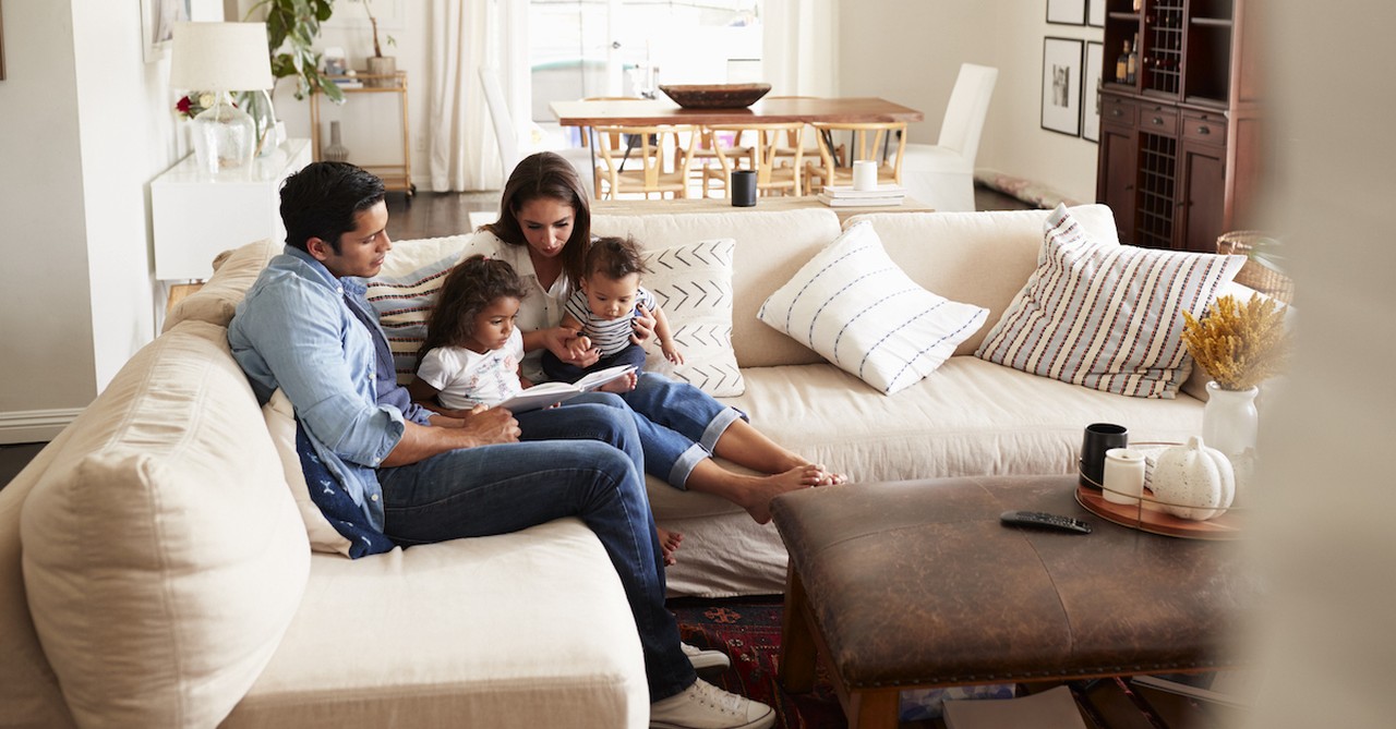 Family inside their home on couch