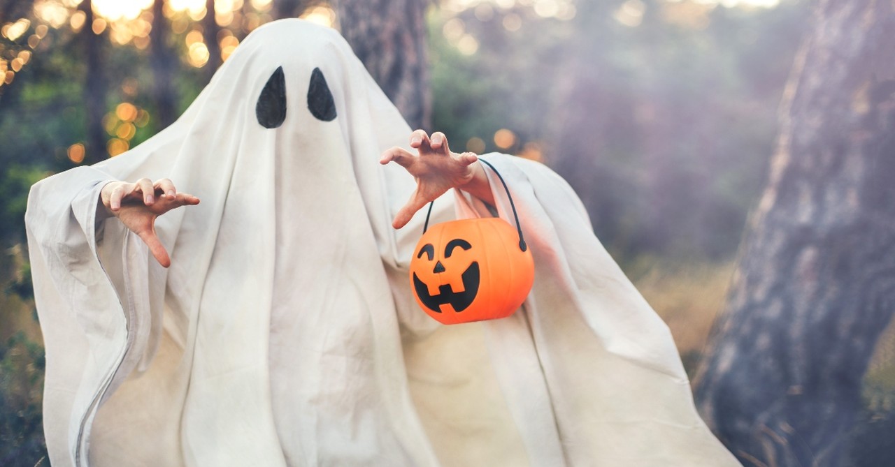 Child as a ghost trick or treating