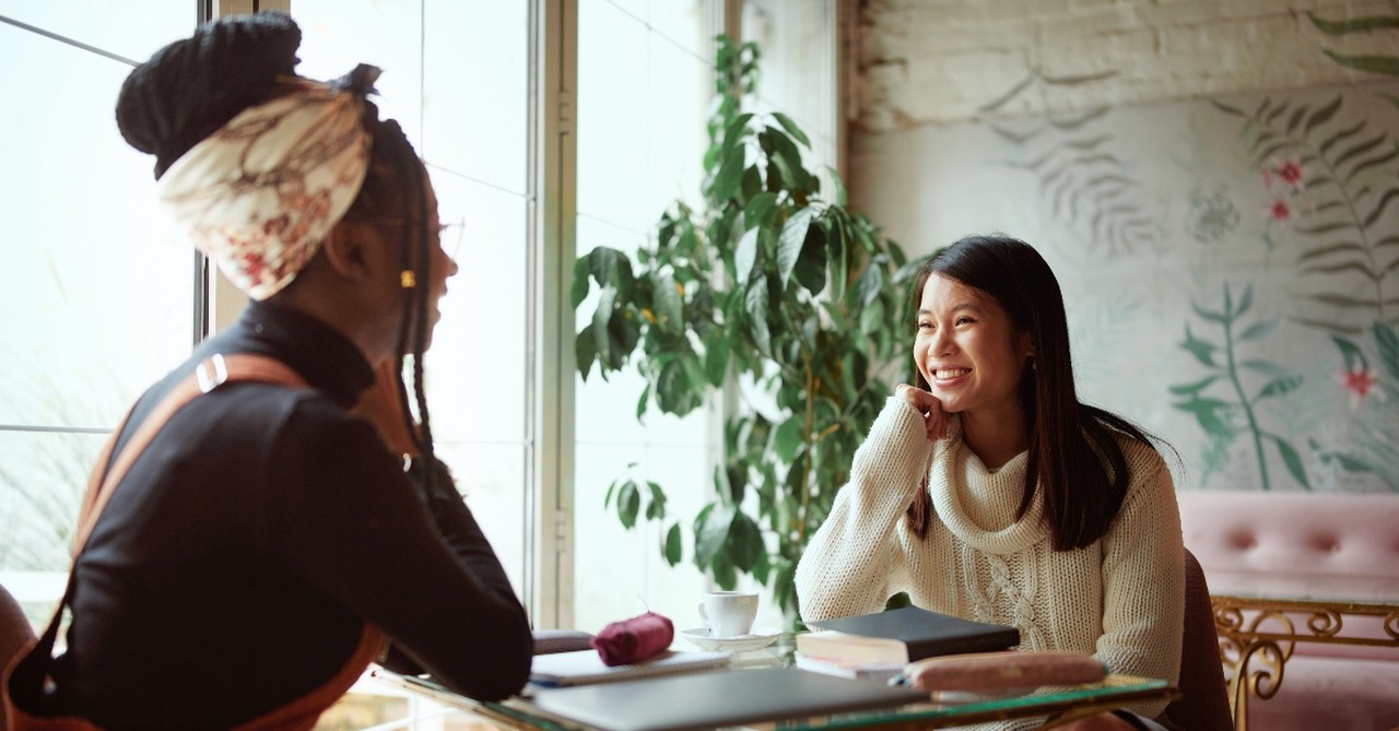 Two women having a Bible study, reasons women play vital role in church community