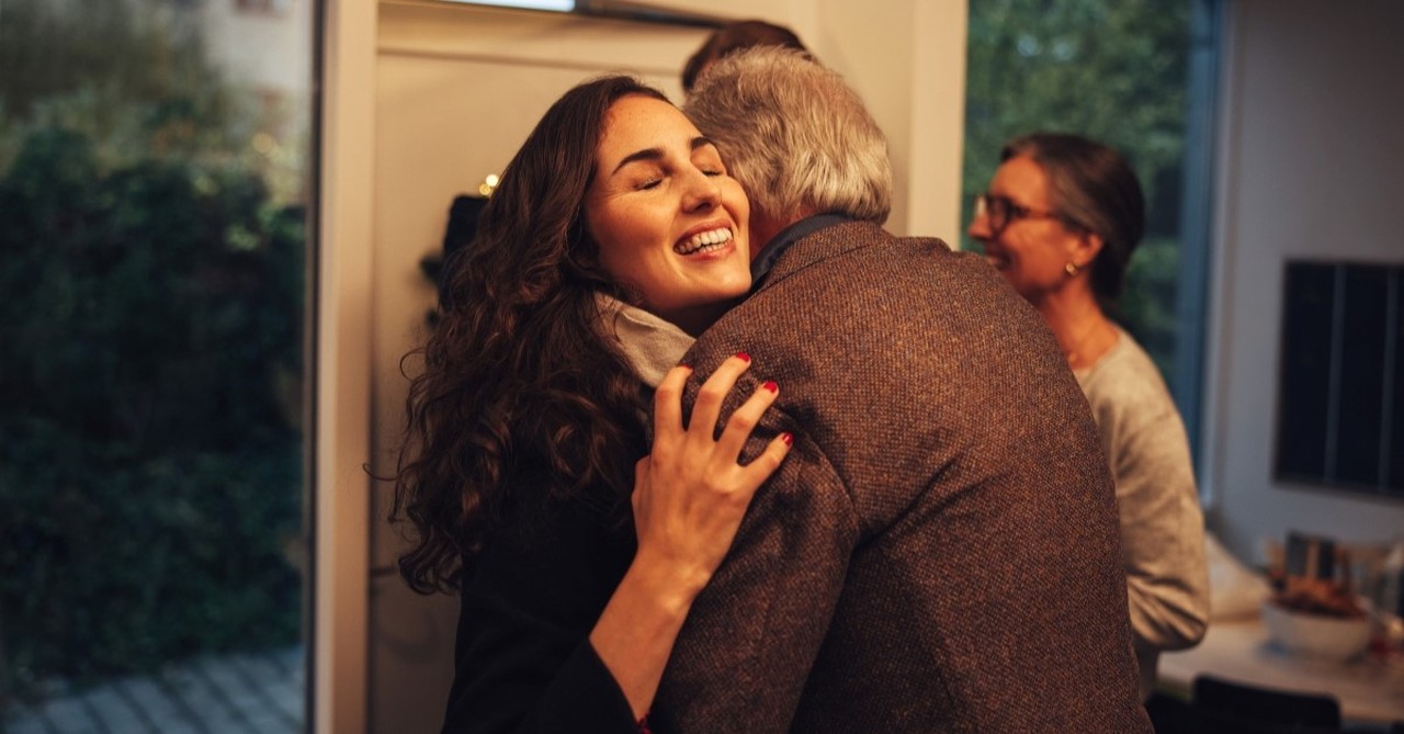 older couple hugging each other as they enter home, why is hospitality important to christians