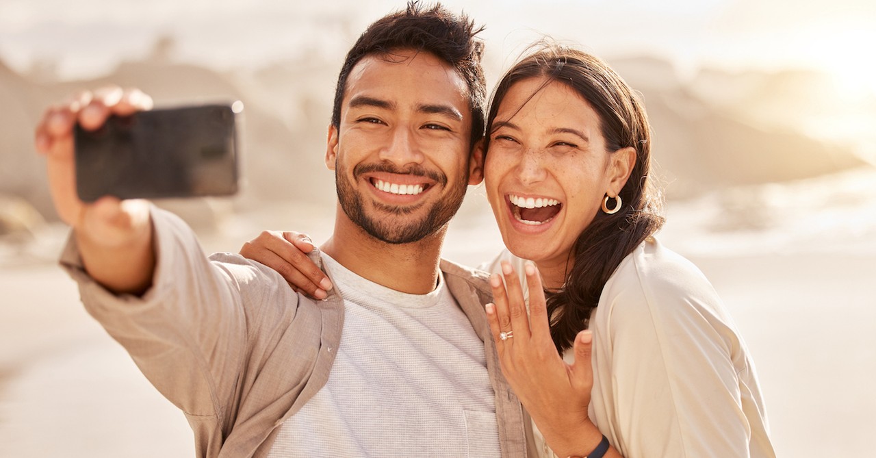 Young happy couple engaged proposal