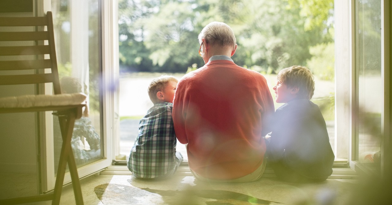 Grandpa talking with grandchildren