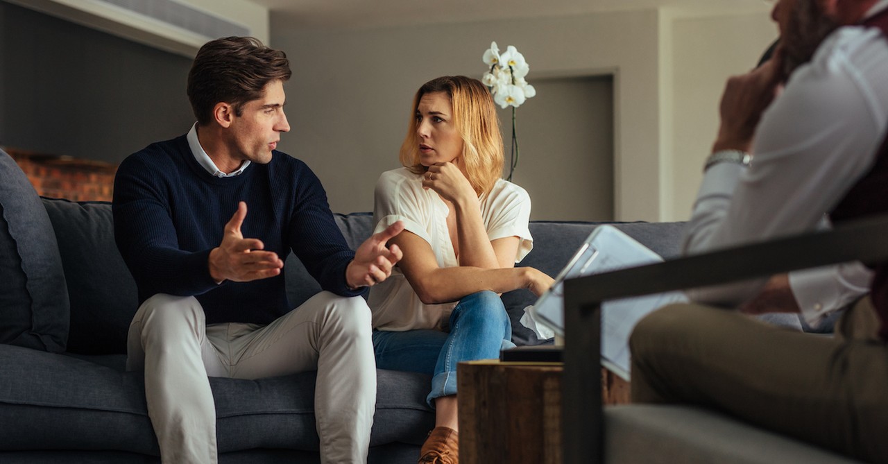 couple talking in marriage counseling