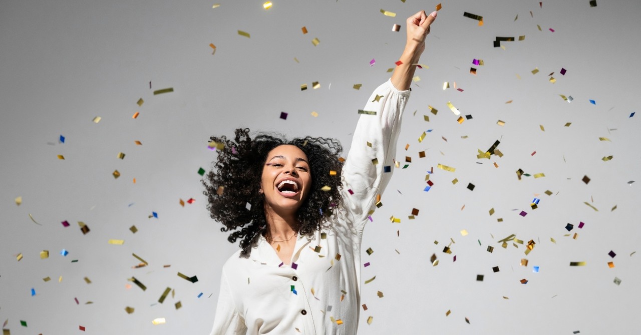 Woman throwing confetti