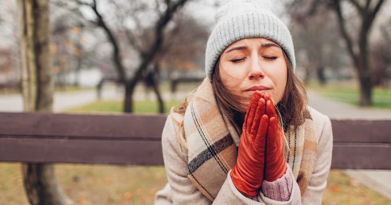 grieving woman crying and praying