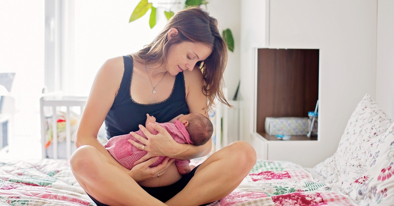 Mom breastfeeding her newborn baby