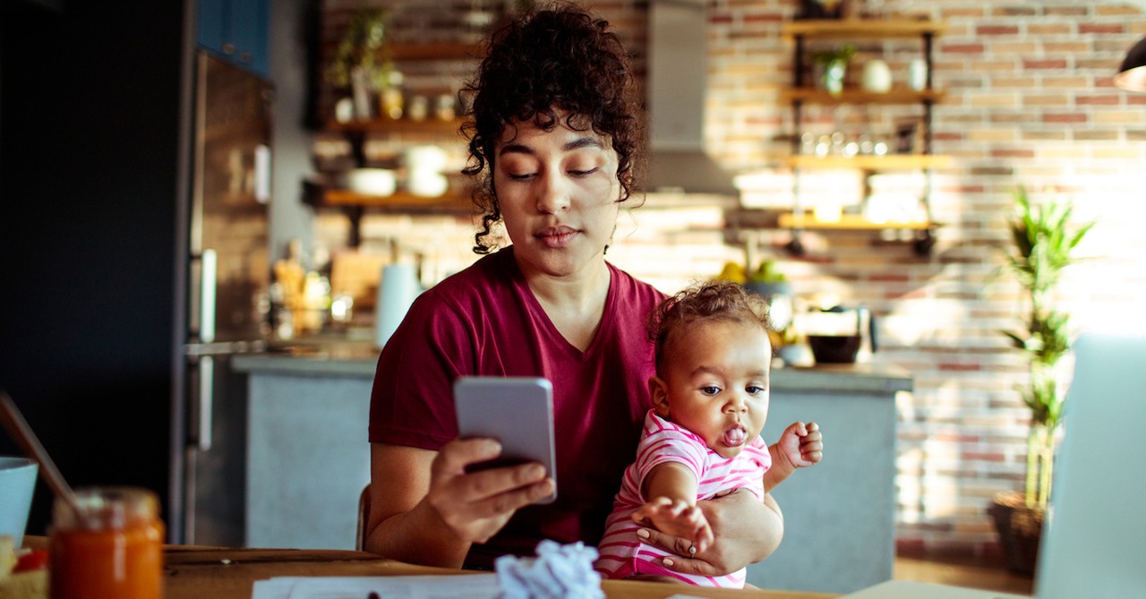 mom ignoring baby on phone