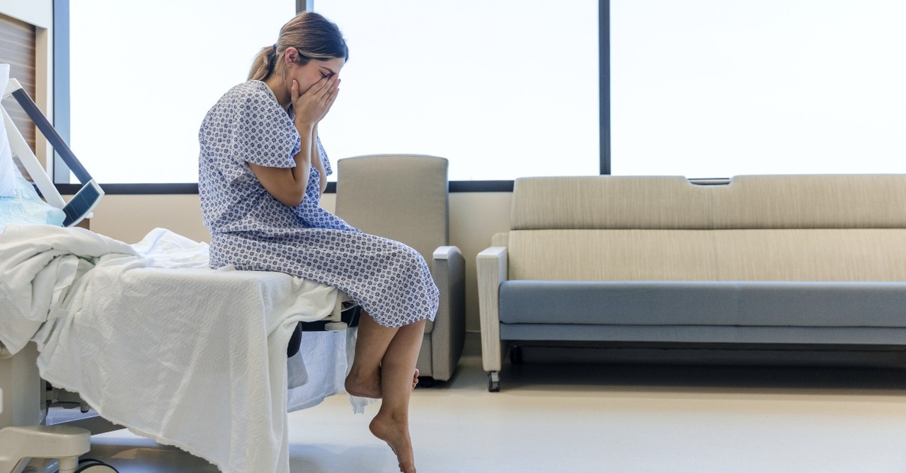 Woman on a hospital bed