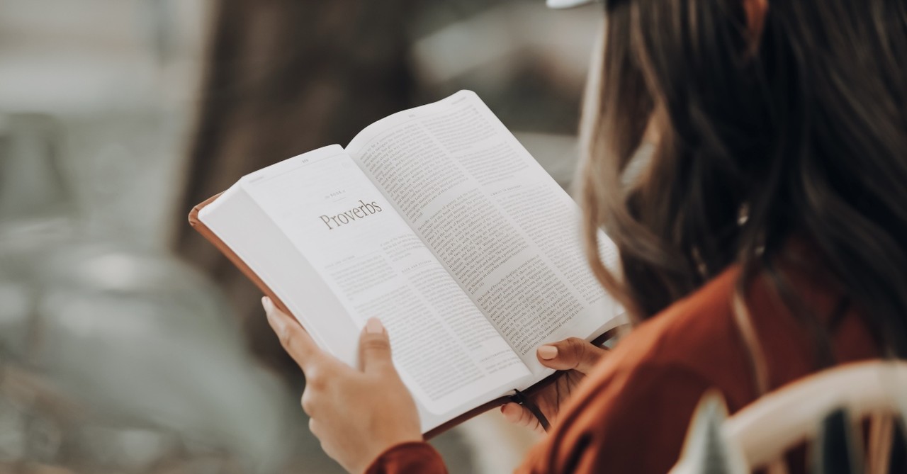 Girl reading the Bible