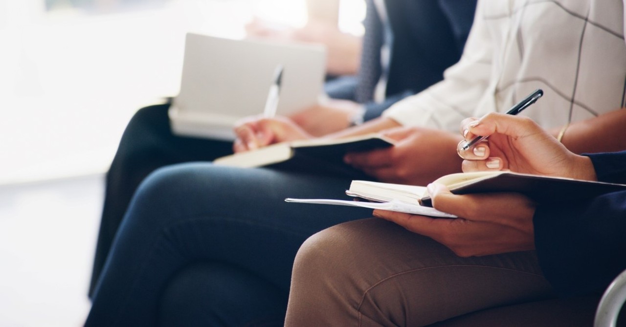 people taking notes at writers conference, christian fiction authors