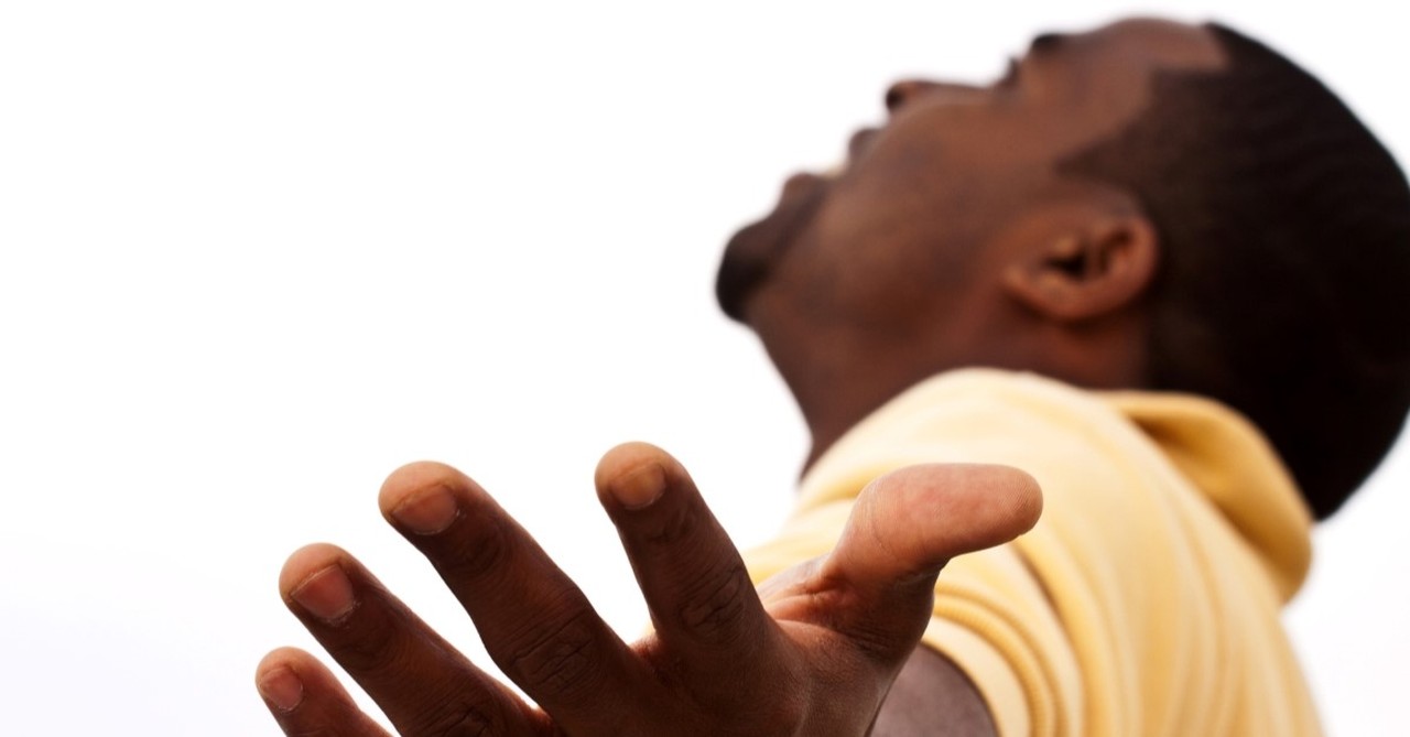 african american man singing worship songs, care free christianity