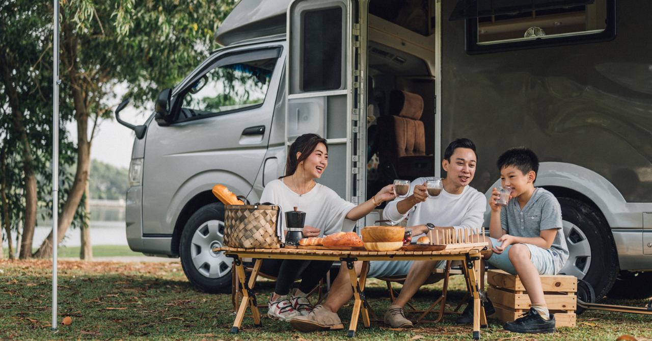 Family camping, enjoying a picnic; cost effective vacations.