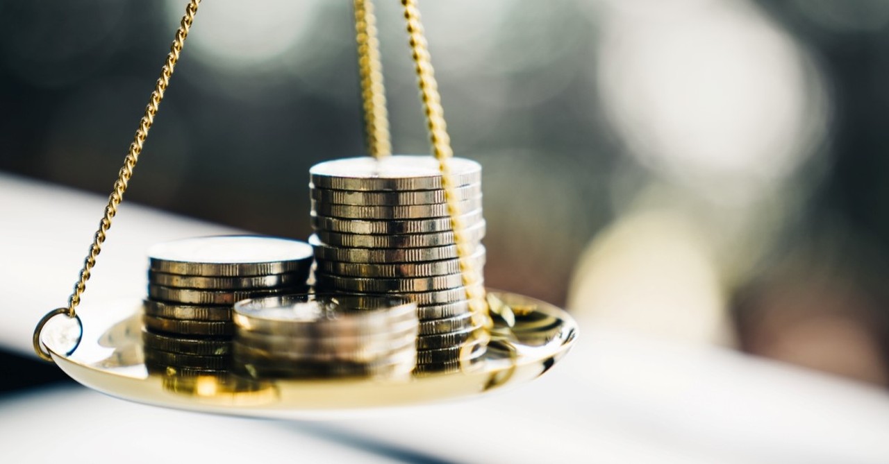 pile of coins on scale, misthios meaning bible