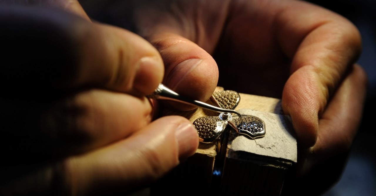 man engraving wood, oholiab