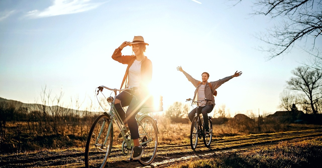 Couple riding bikes