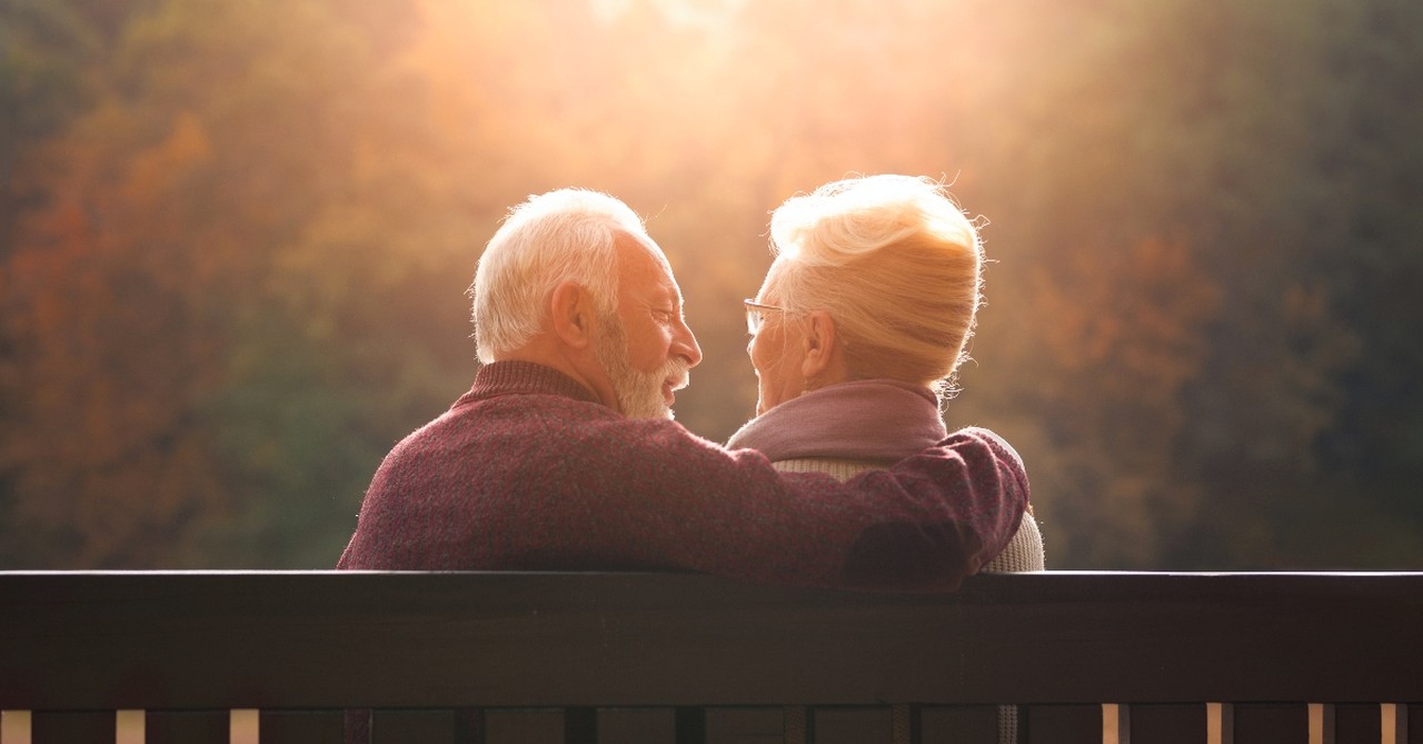 Older married couple on a bench