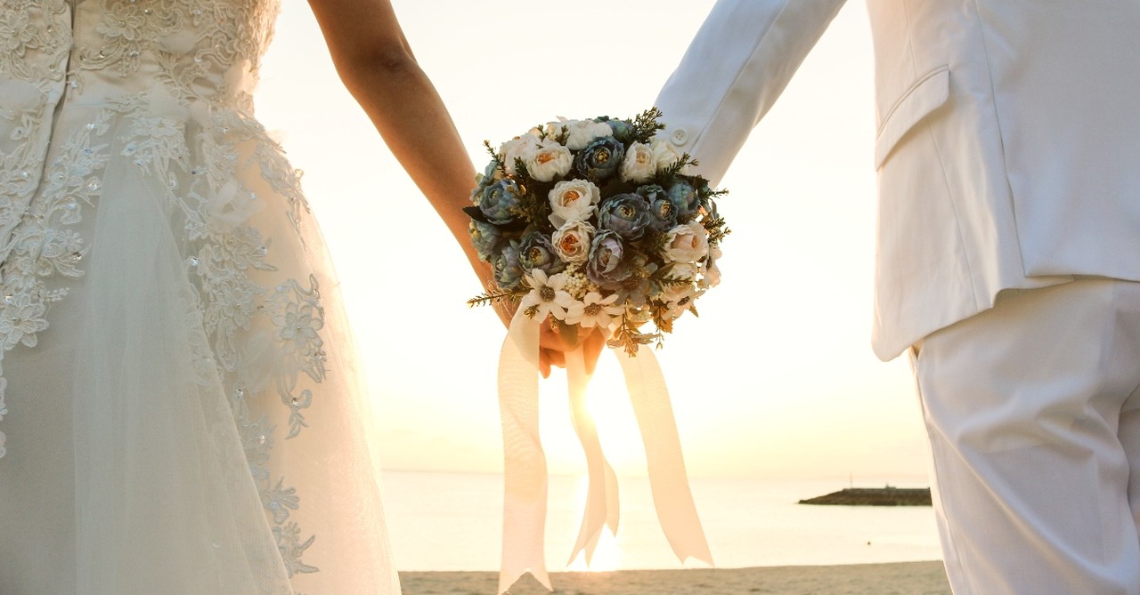 Bride and groom with bouquet