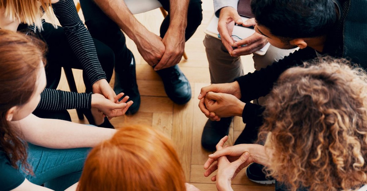 Teens praying;