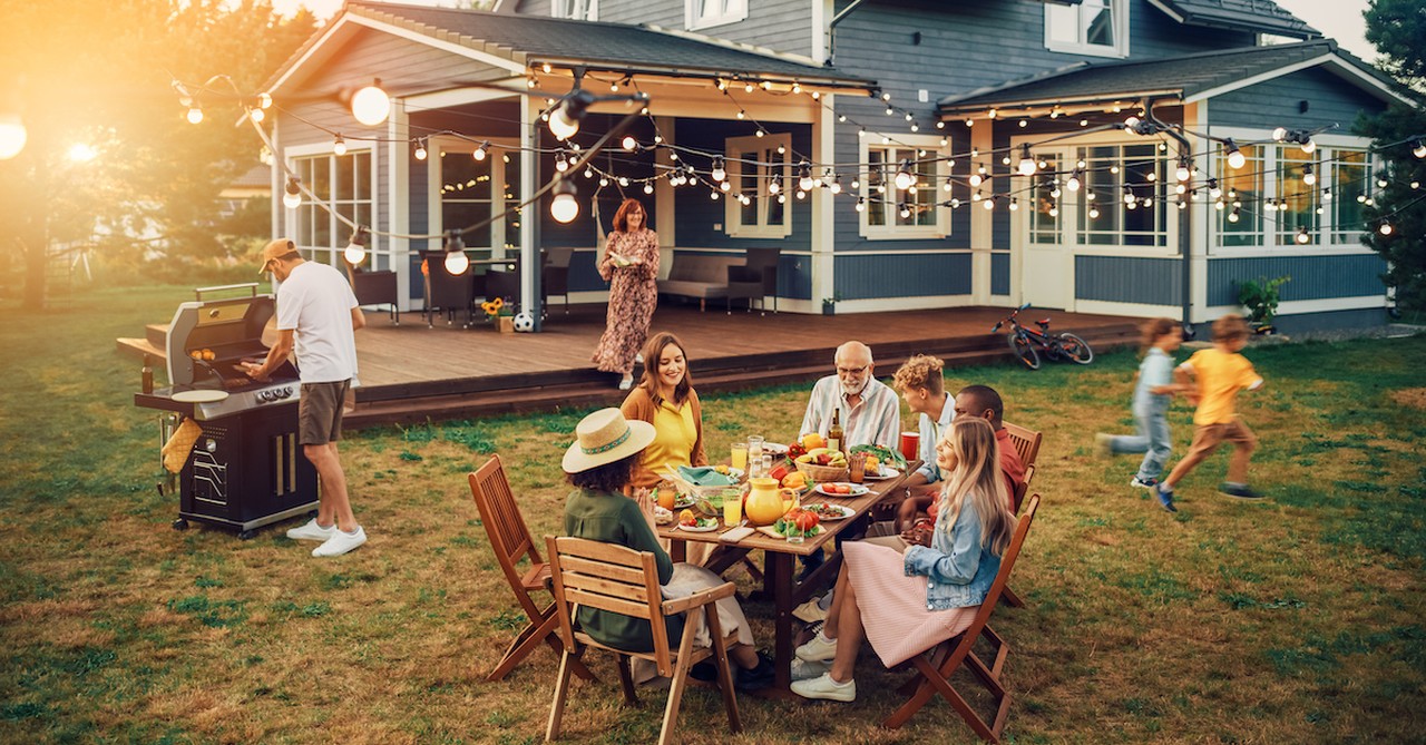 family gathering outside at house