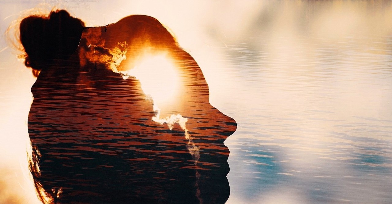 woman's mind with sunny backdrop
