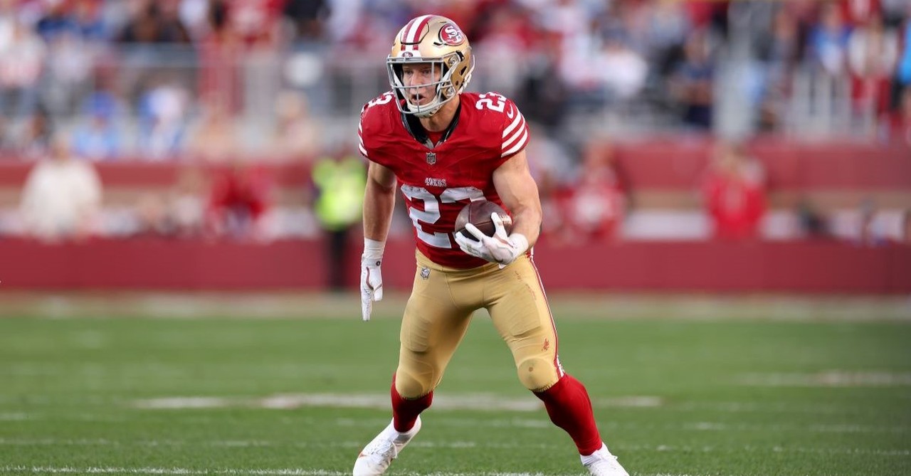 49ers running back Christian McCaffrey makes a cut on a run