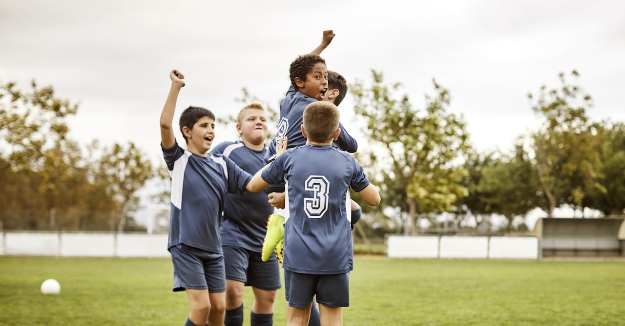 family sports game soccer field kids