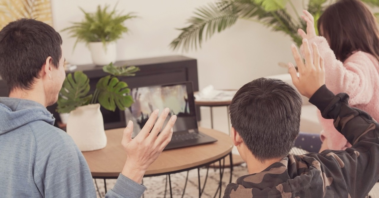 People watching church virtually in room online