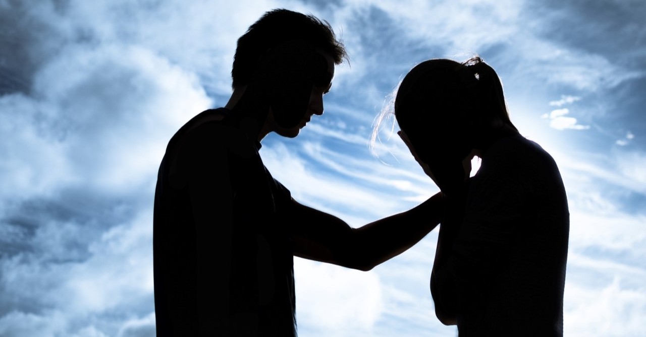 silhouette of man comforting sad woman reasons why christians should care about antisemitism