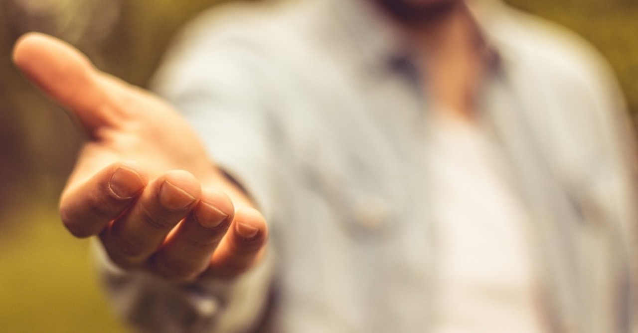 man offering a helping hand