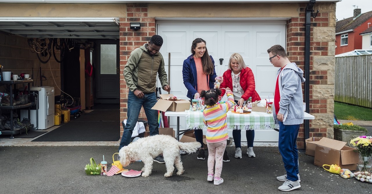 Family shopping at yard sale