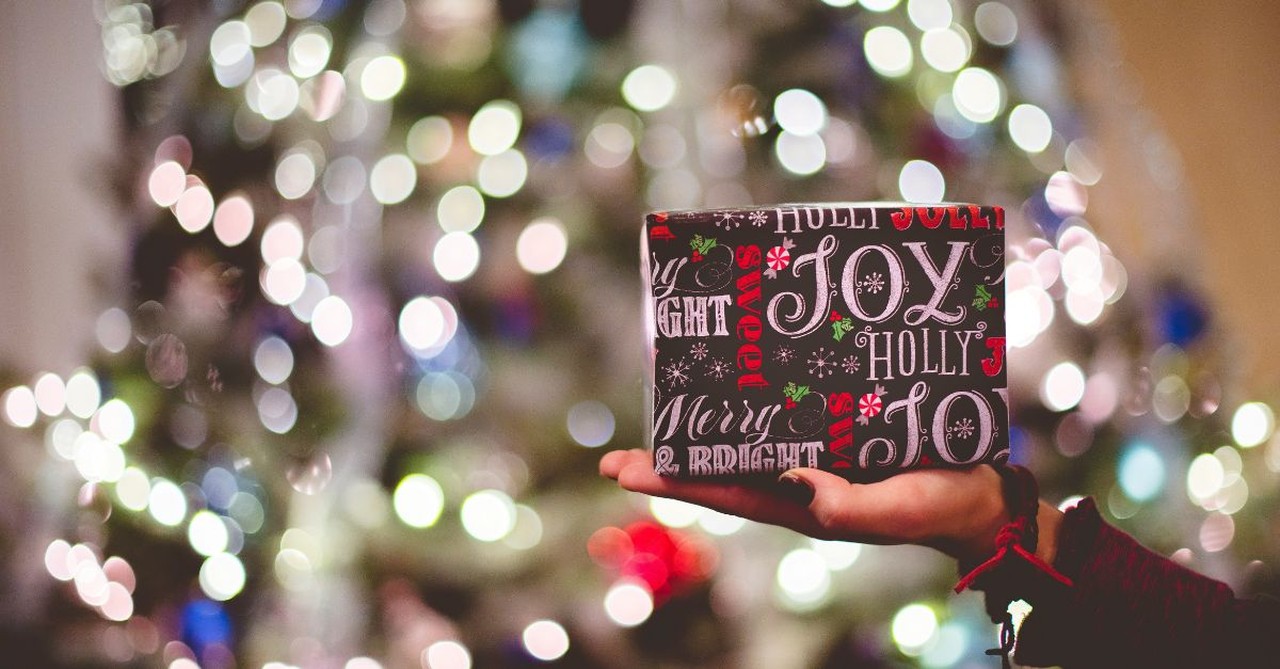 Couple exchanging gifts at Christmas