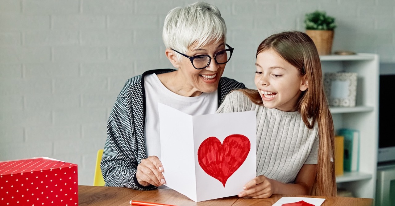 Senior grandma giving Valentine's Day card