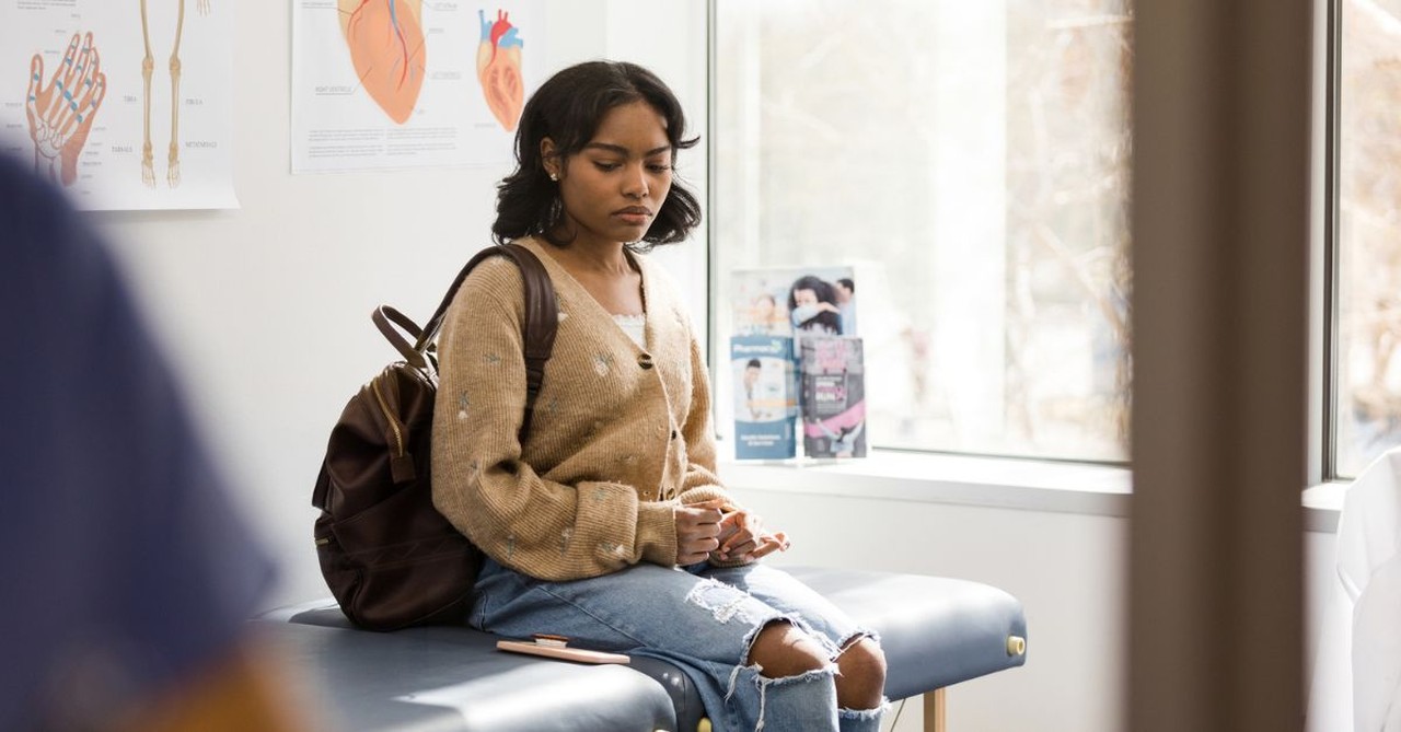 young woman at doctor office; young girl at nurse; abortion; pregnancy