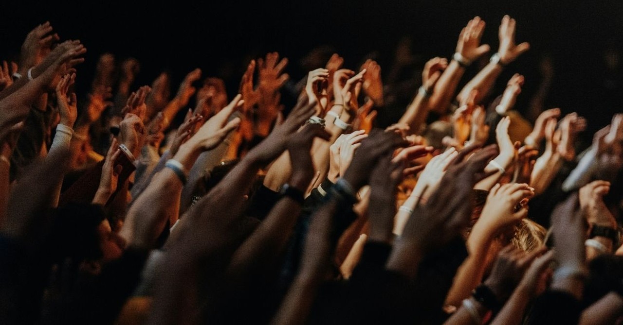 Congregation with Hands in the Air at Church