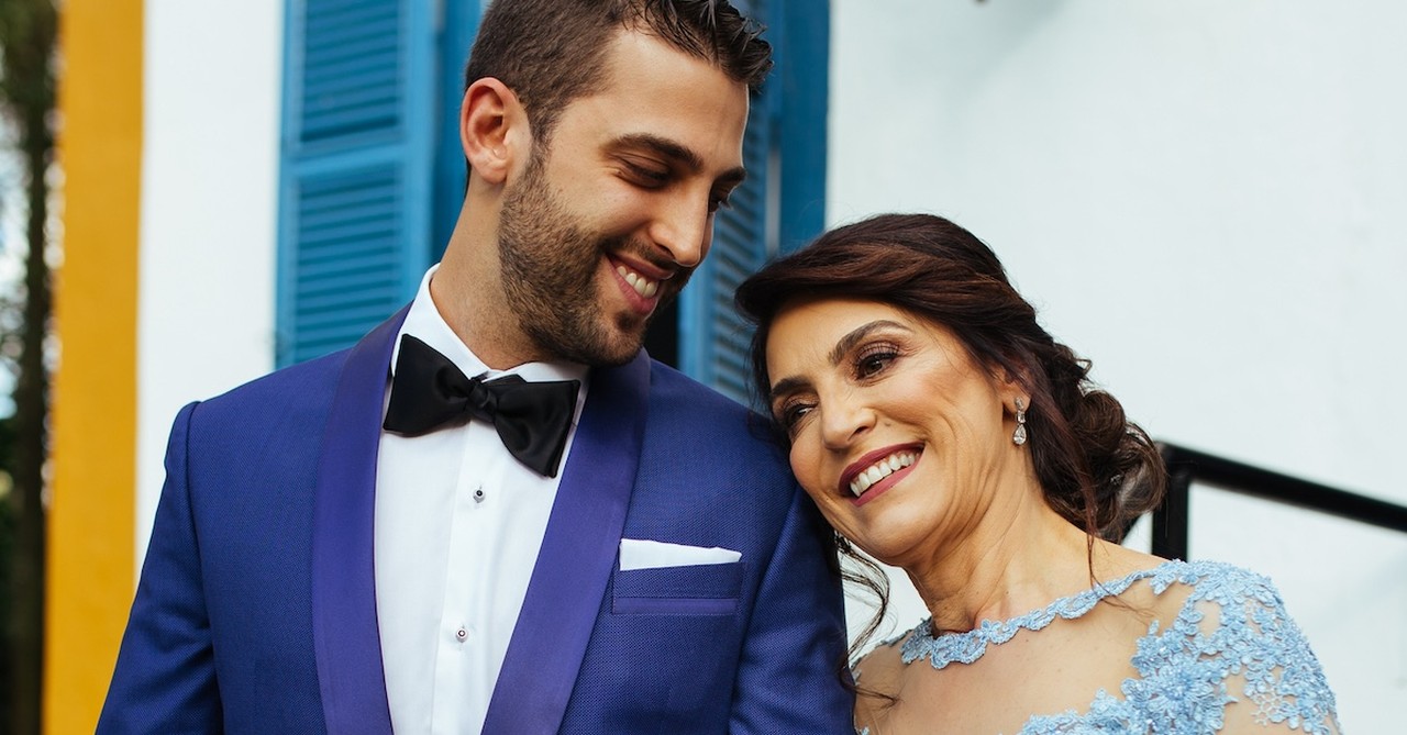 Mother with adult son groom wedding day