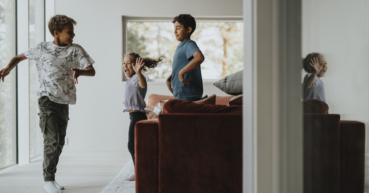 Kids siblings running inside home playing