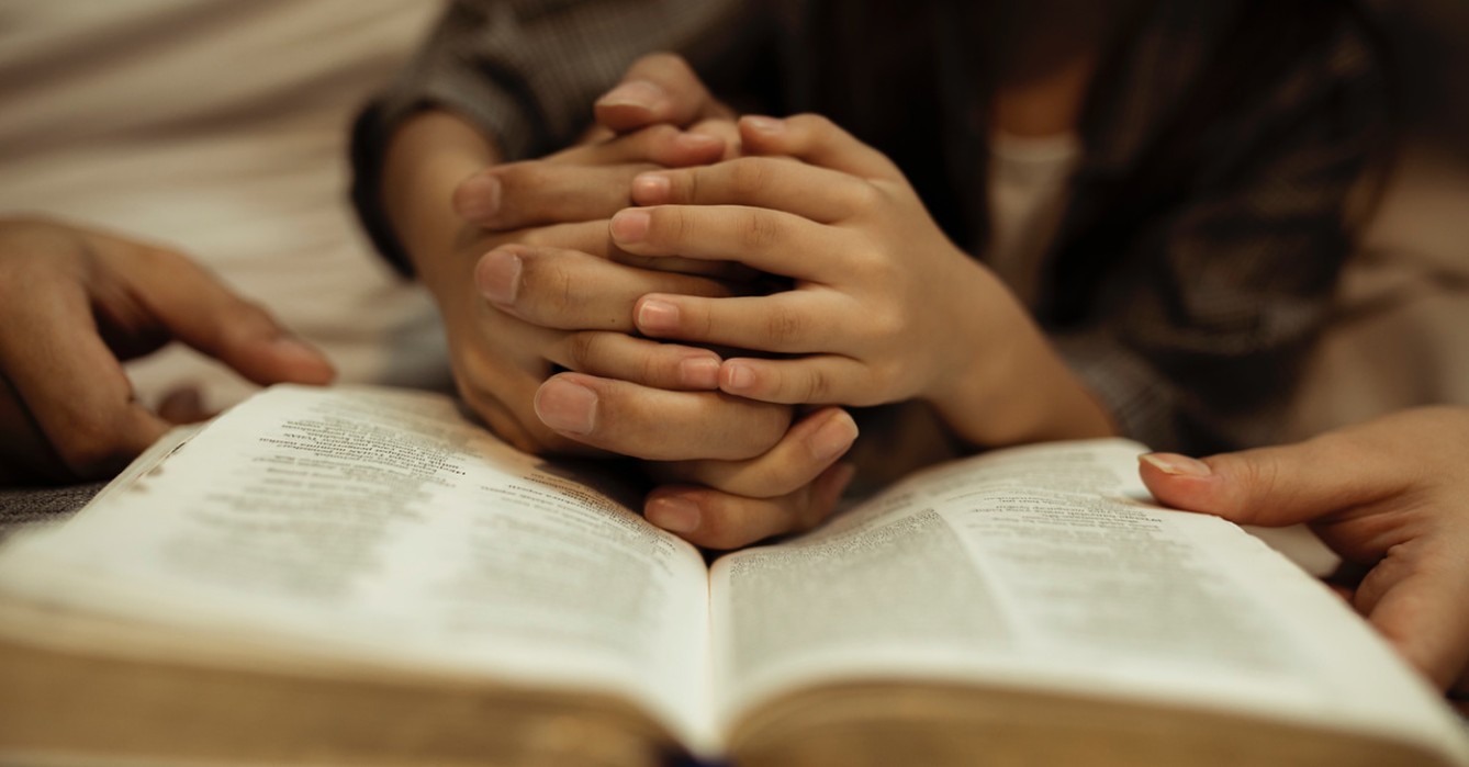 A mother and daughter read the Bible and a young mother is shot while reading the Bible to her child