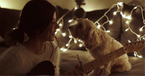 Girl Sings ‘Christmas Time Is Here’ While Adorable Dog Watches