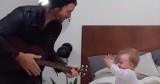 Dad Sweetly Serenades Baby Girl