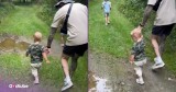 Little One Can’t Resist the Puddle