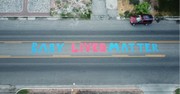 Artist Paints 'Baby Lives Matter' Mural Outside of Planned Parenthood Clinic