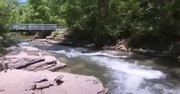 Young Girl Is Saved by Good Samaritan after Falling 15 Feet into a Waterfall