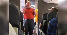 Airline Worker Sings 'You Raise Me Up' For Grieving Mother On Flight