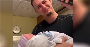 Emotional Dad Tears Up Holding Newborn Baby