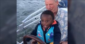 Toddler Has The Biggest Smile When Dad Lets Him Drive The Boat
