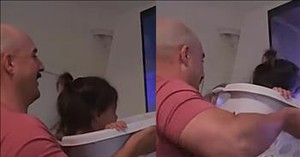 Father Creates Adorable Roller Coaster Ride For Daughter with Laundry Basket