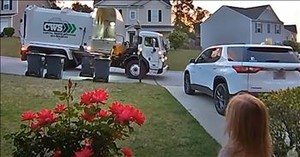 Little Girl Forms Adorable Connection with Sanitation Worker